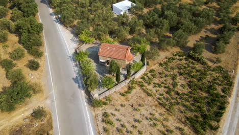 ancient chapel along the road on the mountain in crete island, greece