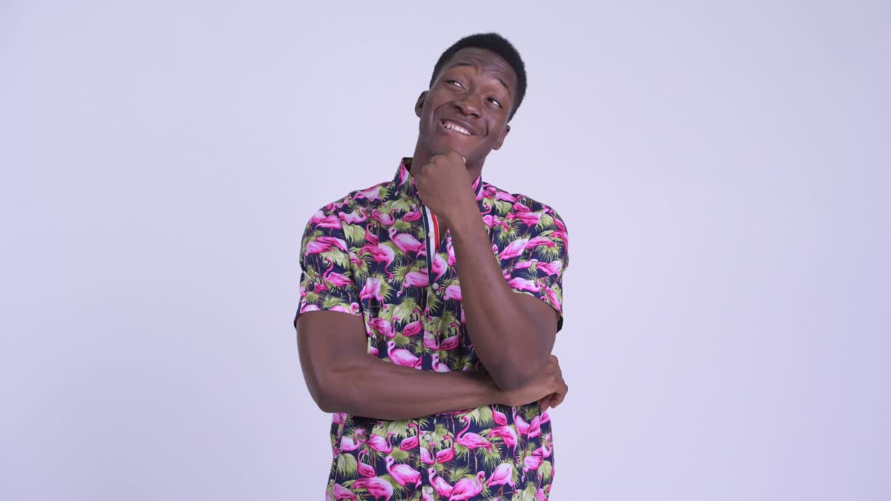 Young handsome African tourist man