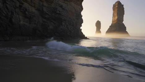 majestic sea stacks and waves at dawn or dusk