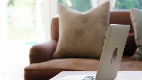 Laptop on table in living room