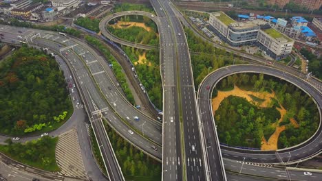 china wuhan cityscape day time traffic road junction aerial panorama 4k