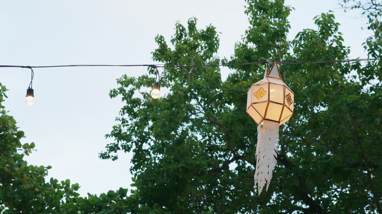White Paper Lanterns and String Lights