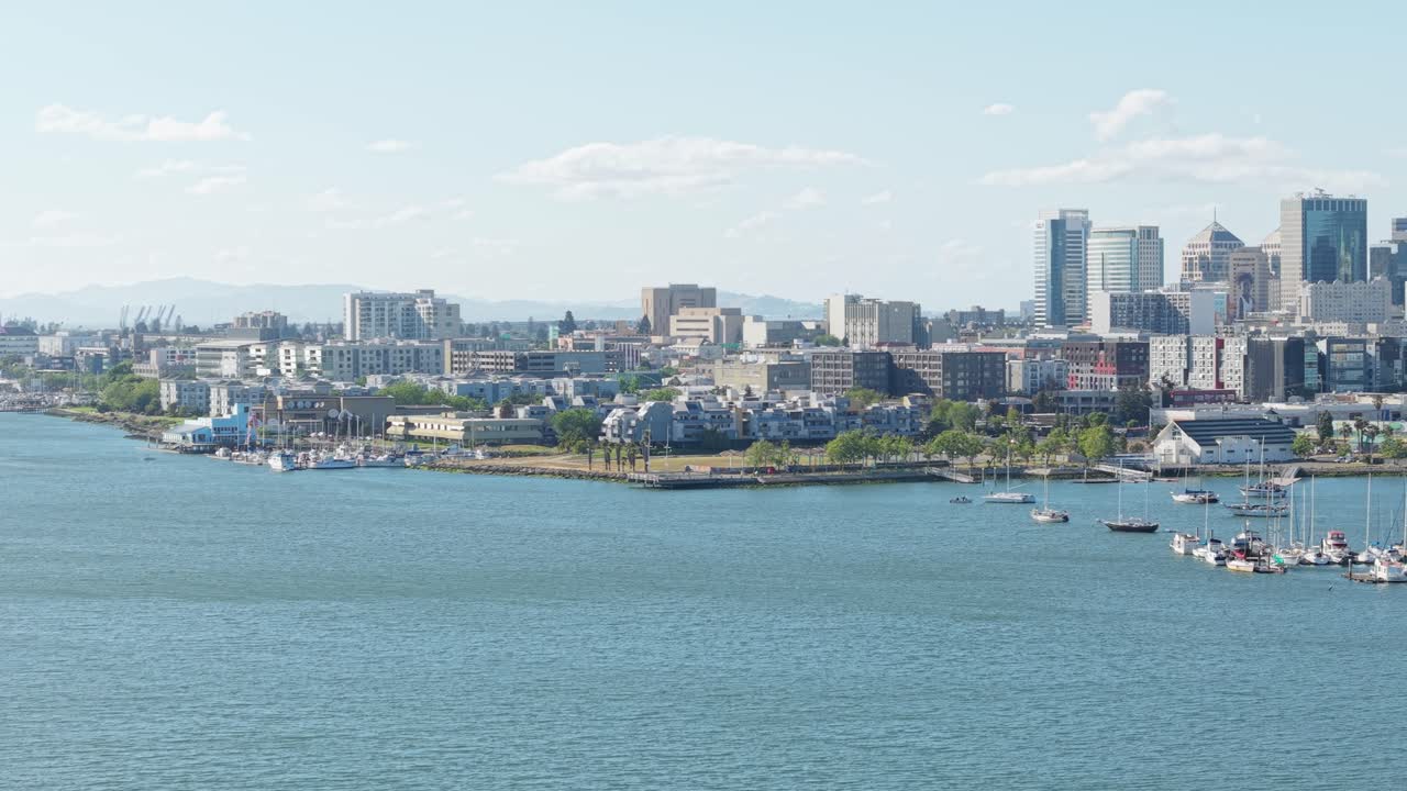 A rotating aerial pan of the Oakland shoreline with Downtown Oakland in the distance. Shot in 4K on a DJI Air 3S.