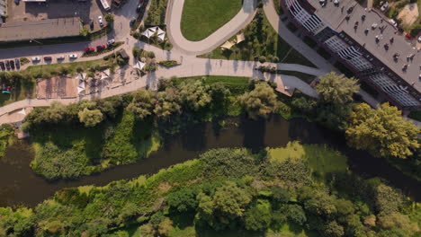 aerial view of urban park with river