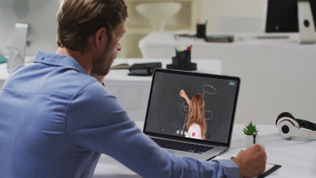 Caucasian male student using laptop on video call with female teacher