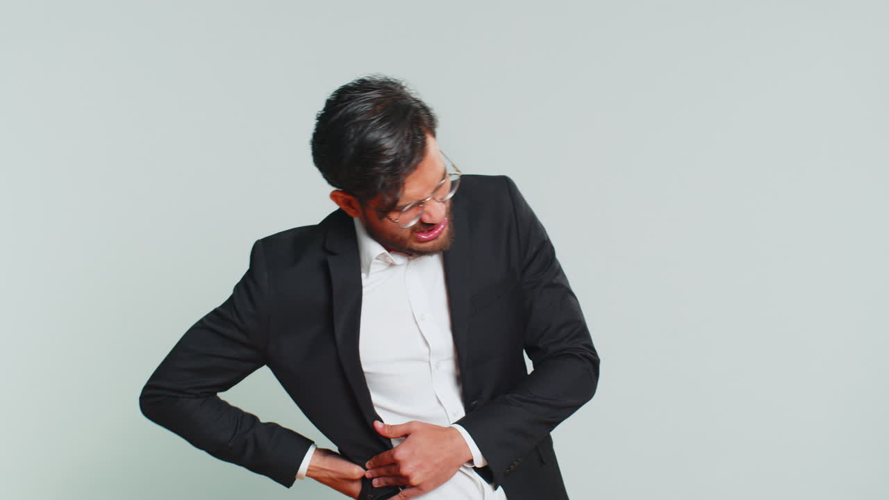 Man touching injured sore back backache suffering lower lumbar discomfort muscle pain of overwork