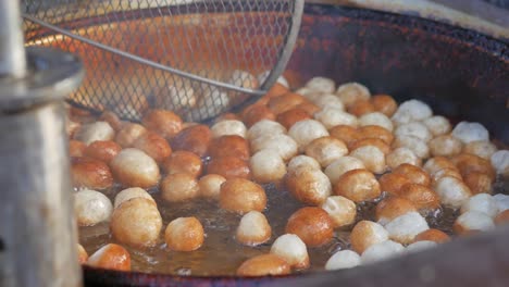 deep frying delicious dough balls