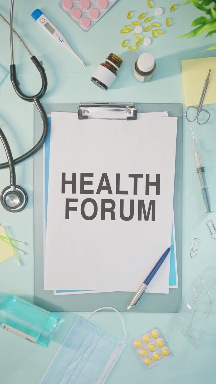 VERTICAL VIDEO OF HEALTH FORUM WRITTEN ON MEDICAL PAPER