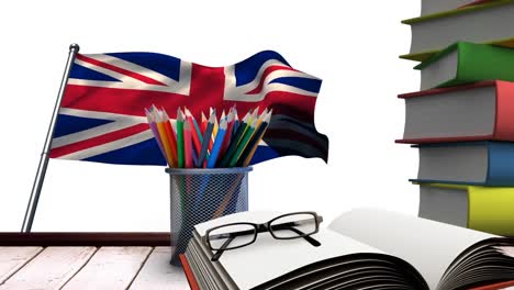 books and pencils on wooden table