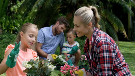 Mother-and-daughter-talking-while-gardening-together