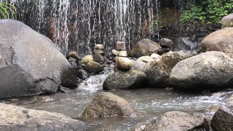 beautiful,calm and tranquil waterfall in a tropical rainforest