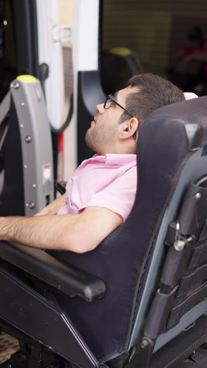 Man in Wheelchair in Accessible Vehicle