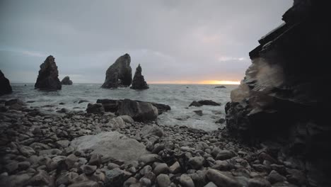 crohy head in donegal ireland ocean wave on rocks in sunset