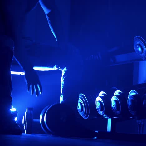 athletic man with dumbells