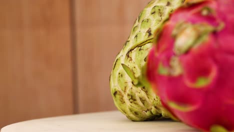 vibrant fruits arranged on a wooden surface