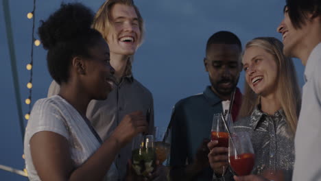 friends enjoying cocktails on a rooftop
