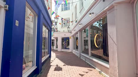 a vibrant alleyway with colorful shops