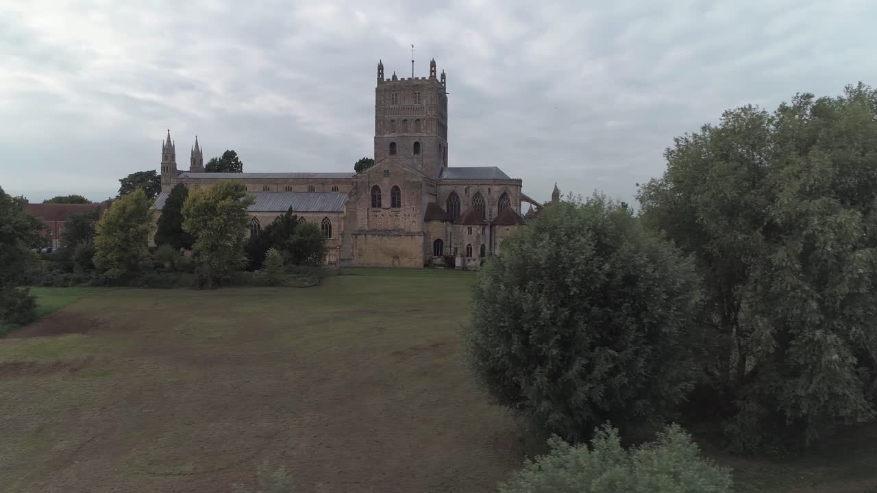 Aerial pan shot of The Abbey Church of St Mary the Virgin in Tewkesbury