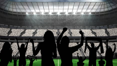 animation of silhouettes of sports fans cheering over sports stadium