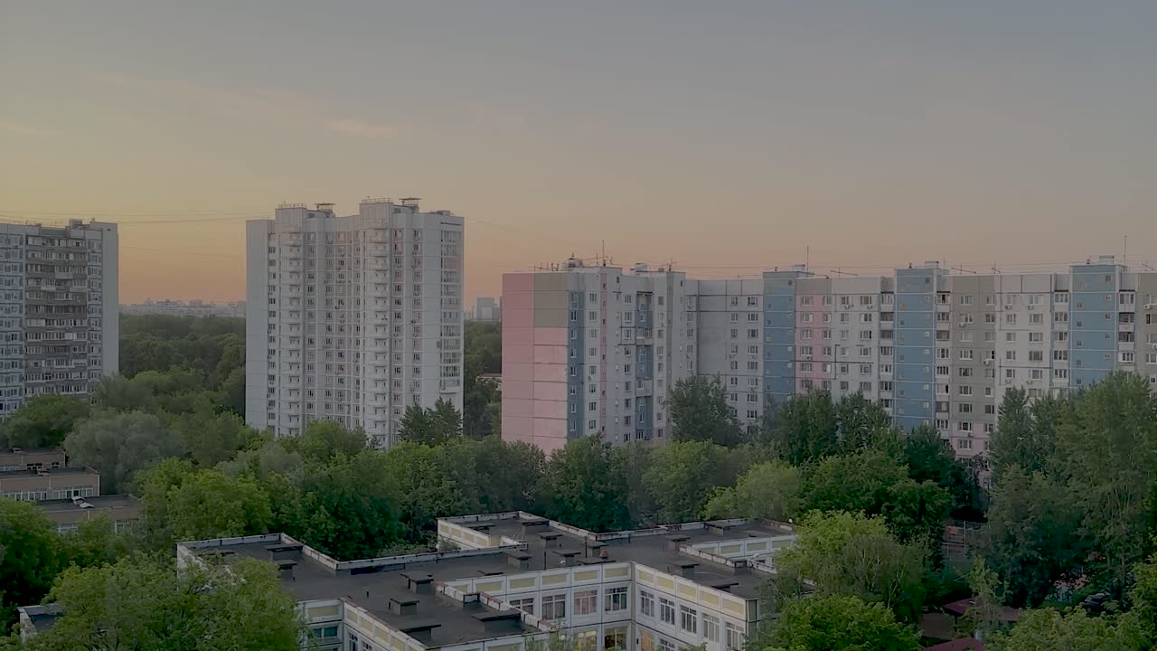 Sunrise over a residential area on the last day of spring (4K, time lapse)