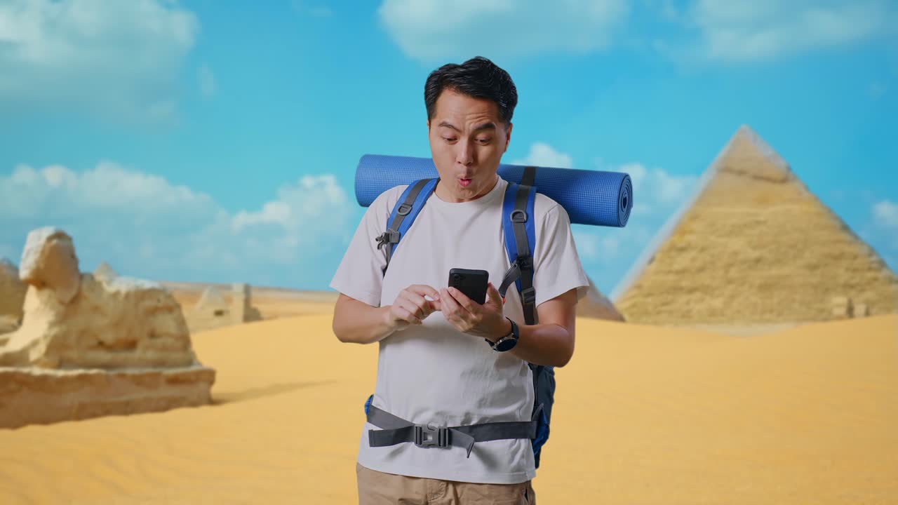 Tourist in Egypt using a phone