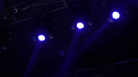 stage lighting with blue beams