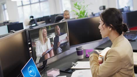 Composition-of-asian-businesswoman-using-computer-and-laptop-with-ai-call-on-screen