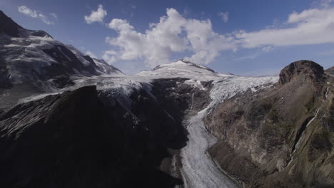 Glaciar-Pasterze-Con-El-Macizo-Grossglockner-Y-El-Pico-Johannisberg,-Austria,-Vista-Aérea