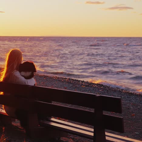 a woman rests with a dog on a bench 1