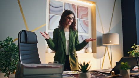 executive manager conducting online conference in office. woman showing thumb up