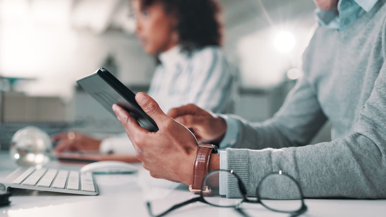 People working in an office using technology