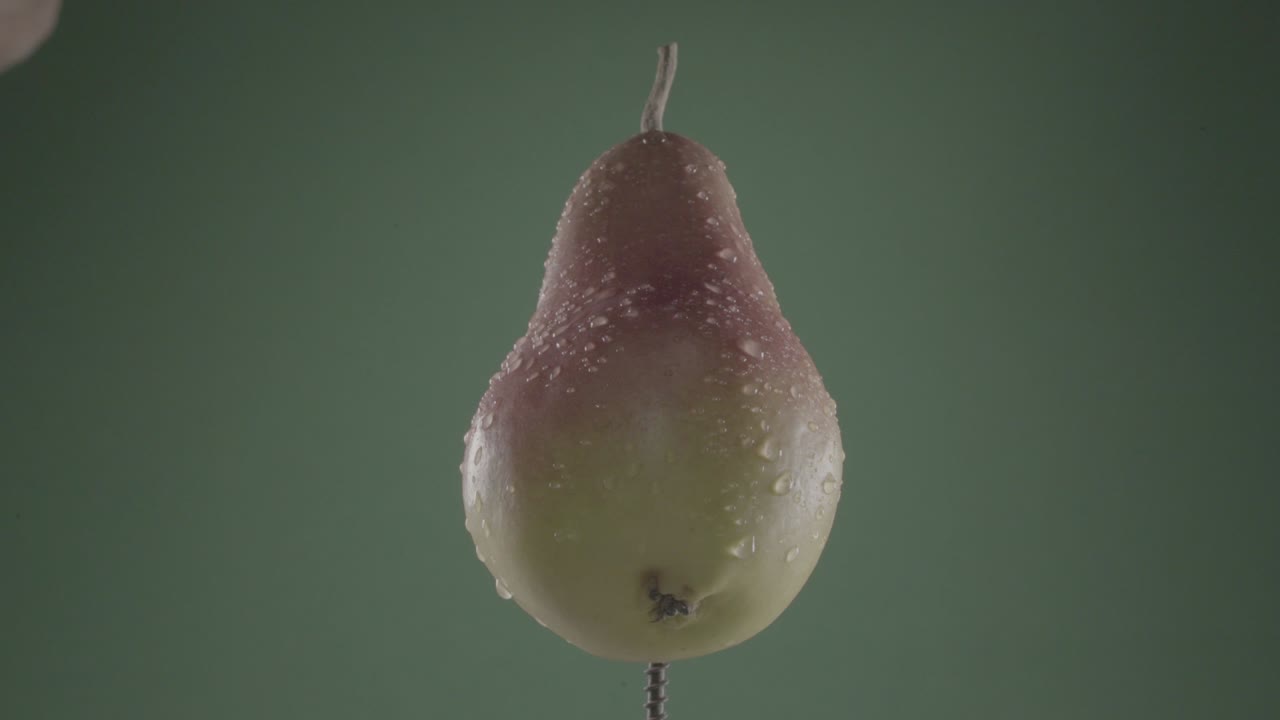 peras girando con bucle en pantalla verde para la llave de croma