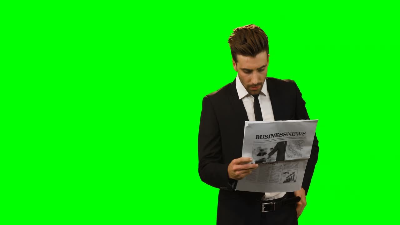 신문을 읽는 사업가