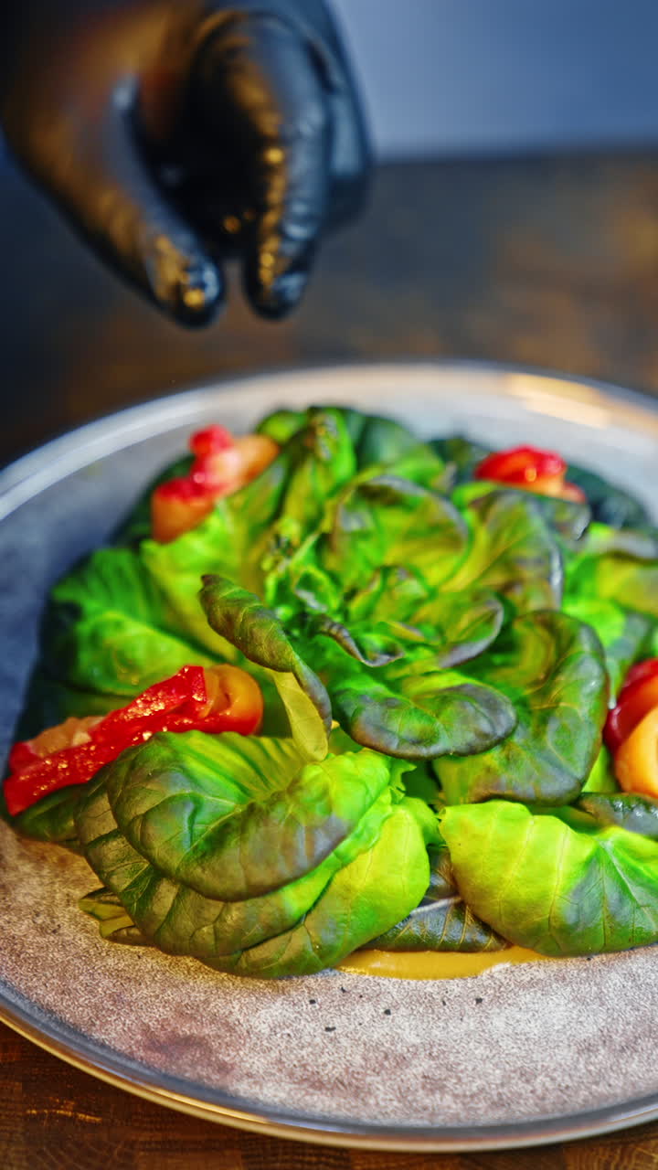 Restaurant meal serving close up view. Delicious food preparation. Vertical video.