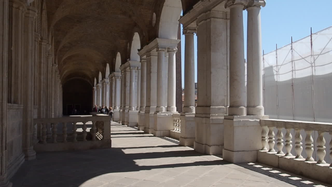 Long Colonnade of Pillars and Arches in Italy