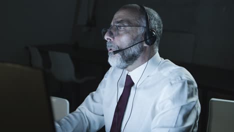 serious male teleworker in headset