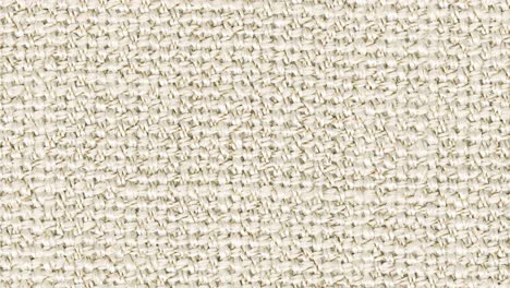 camera slowly zooms into stringy beige weave in extreme detail