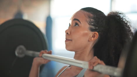 Woman,-barbell-press-and-exercise-in-gym