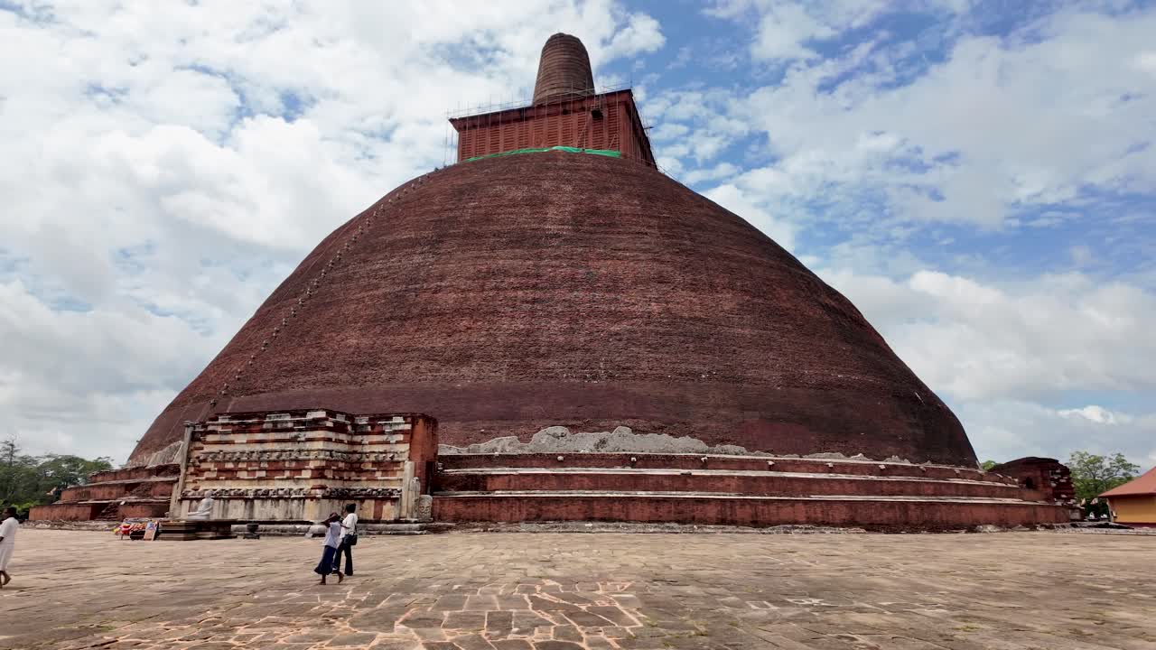 Majestic view of Jetavanaramaya Stupa, an ancient architectural marvel in Anuradhapura, Sri Lanka. Symbol of spiritual and historical significance.