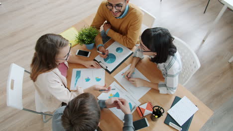 team meeting discussing business data