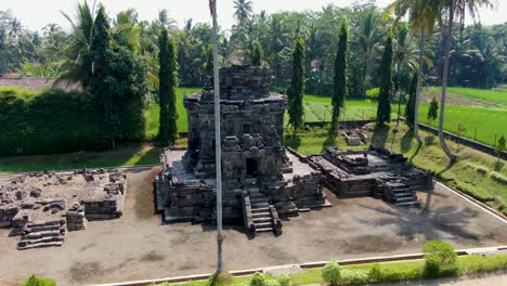 Aerial-circling-shot-of-ancient-Buddhist-temple-Ngawen-on-Java,-Indonesia