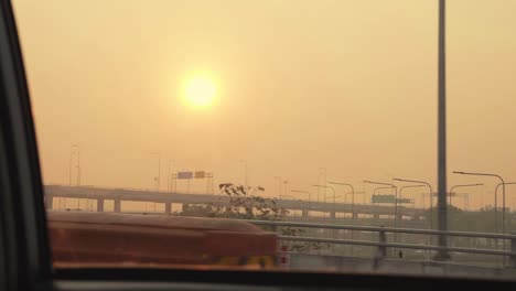 sunrise from car on a highway in slow motion.
