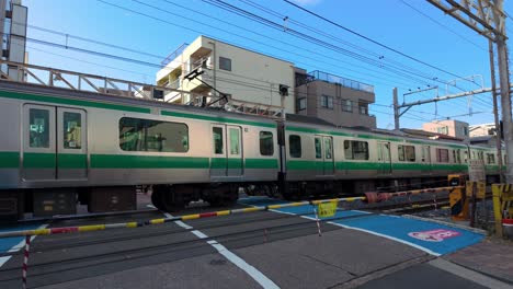 train passing in charming suburb town in tokyo japan