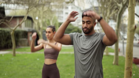 couple, city fitness and stretching arm exercise