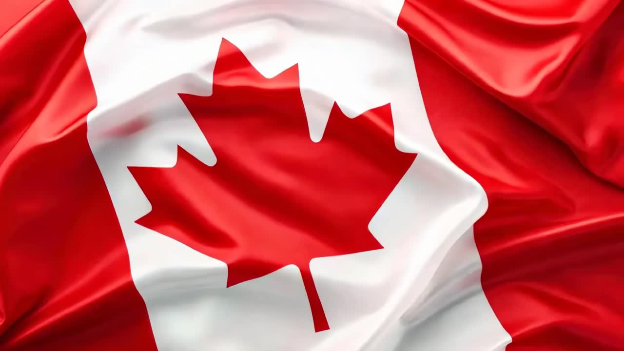 Aerial view of a waving Canadian flag, showcasing its vibrant red and white colors