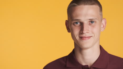 blond guy with blue eyes smiling