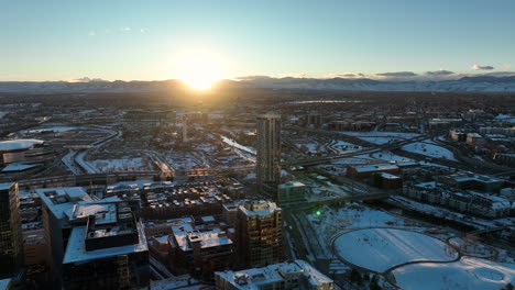 aerial drone shot of sunset moving around over commons park, denver