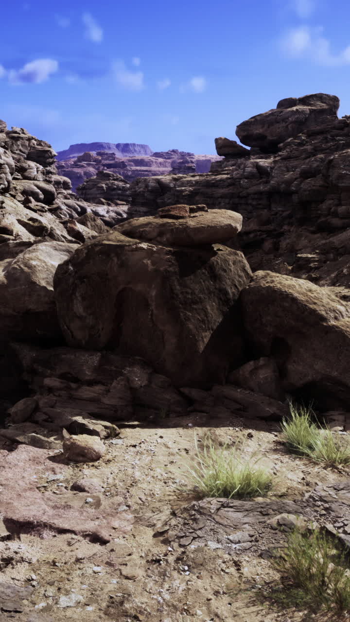 Rock formations and desert landscape in a remote canyon area during daytime
