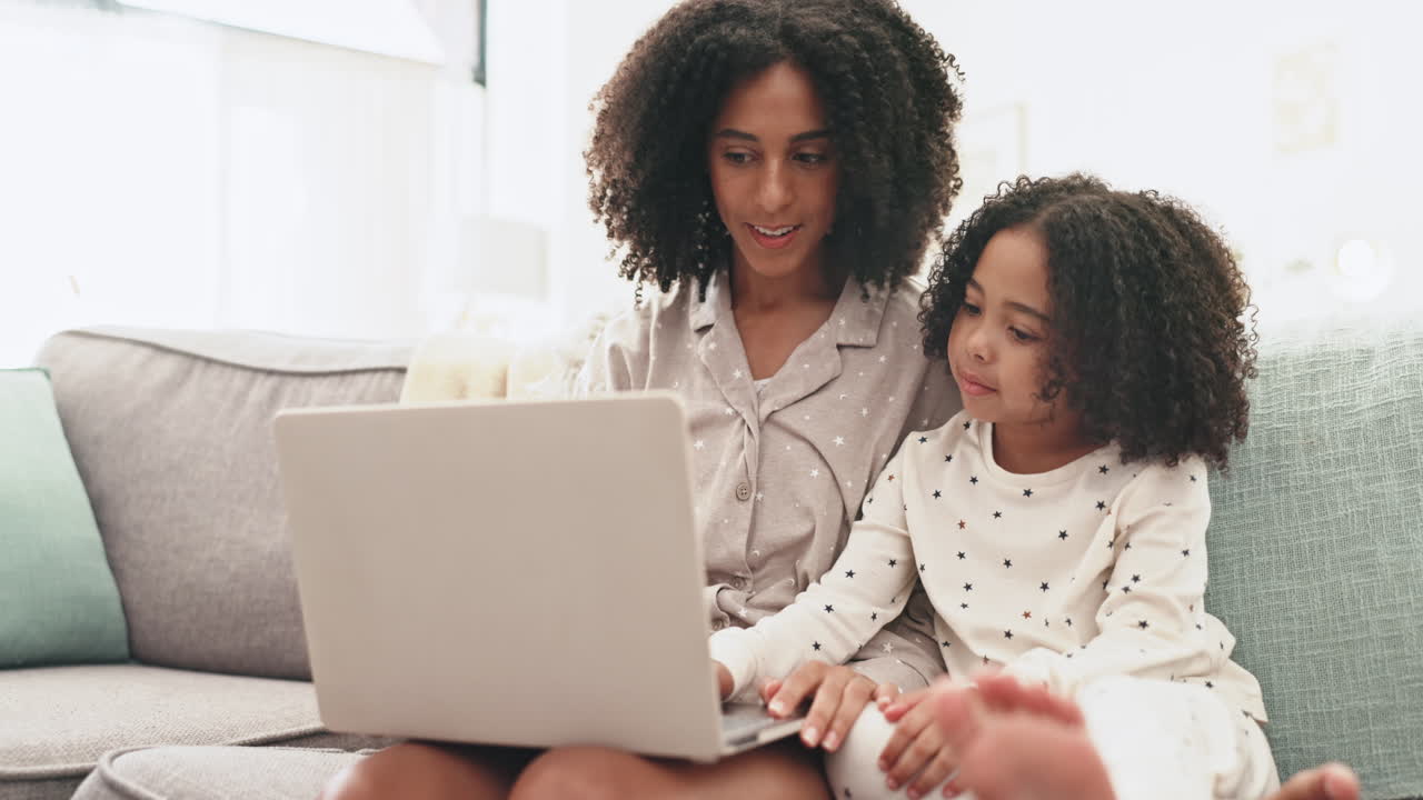 Search, laptop and mother with daughter on sofa
