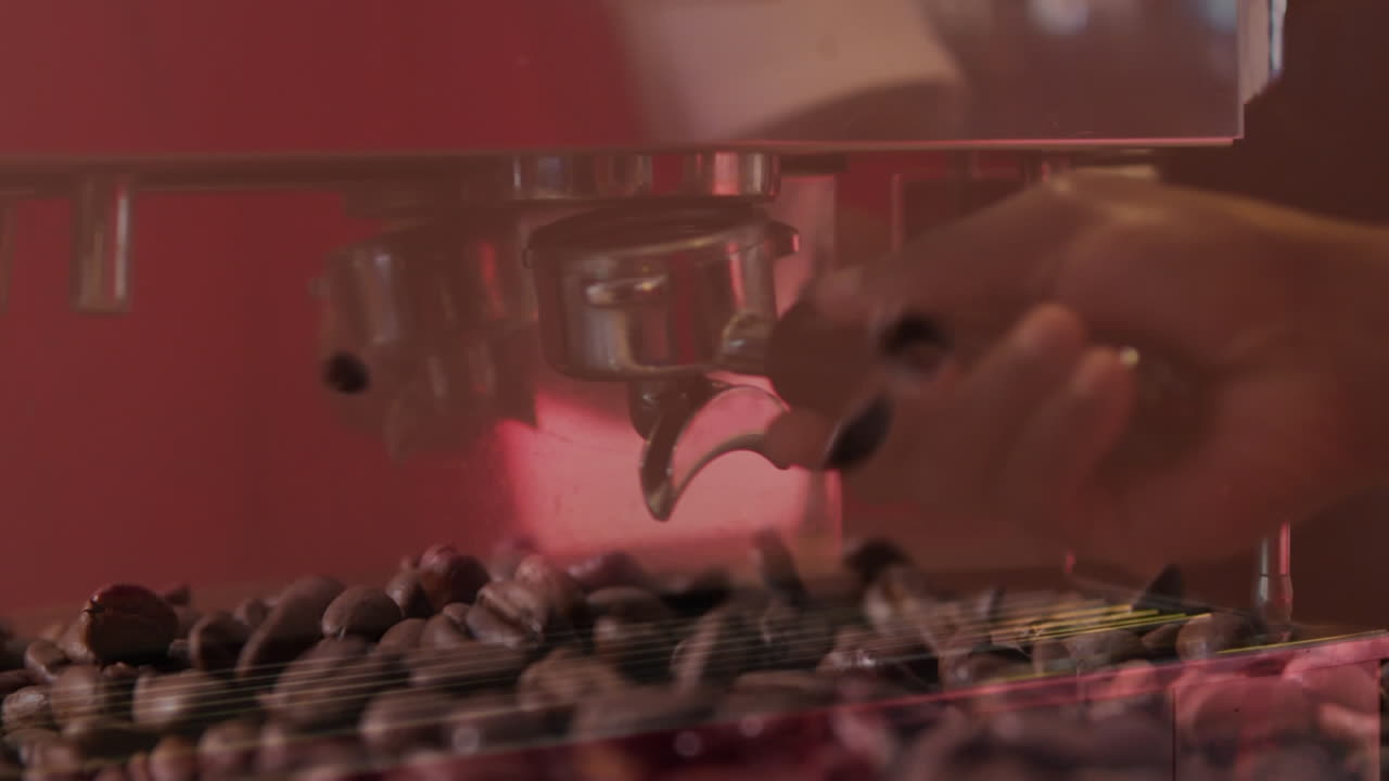 Animation of pouring coffee beans with hands of barista preparing coffee at a cafe